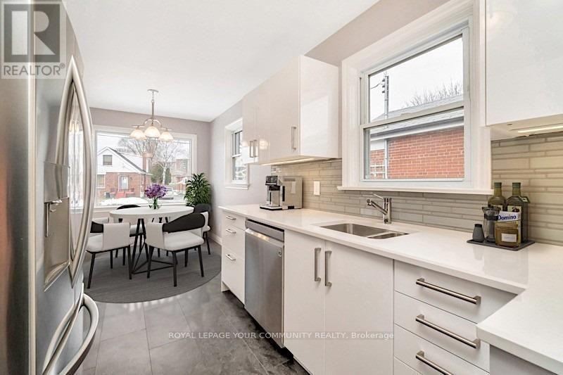 21 Lynvalley Crescent, Toronto, ON - Indoor Photo Showing Kitchen With Double Sink