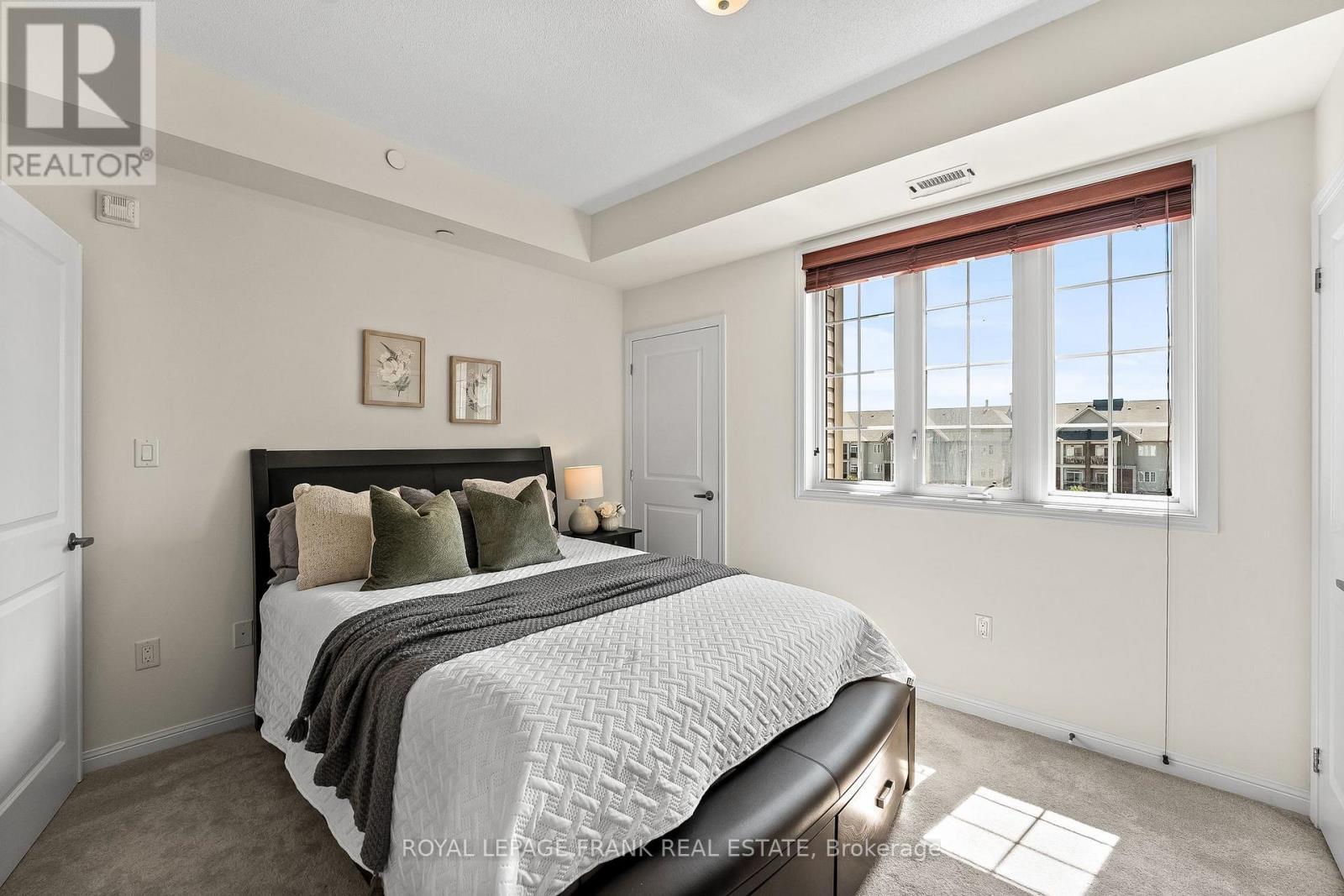 405 - 80 Aspen Springs Drive, Clarington (Bowmanville), ON - Indoor Photo Showing Bedroom