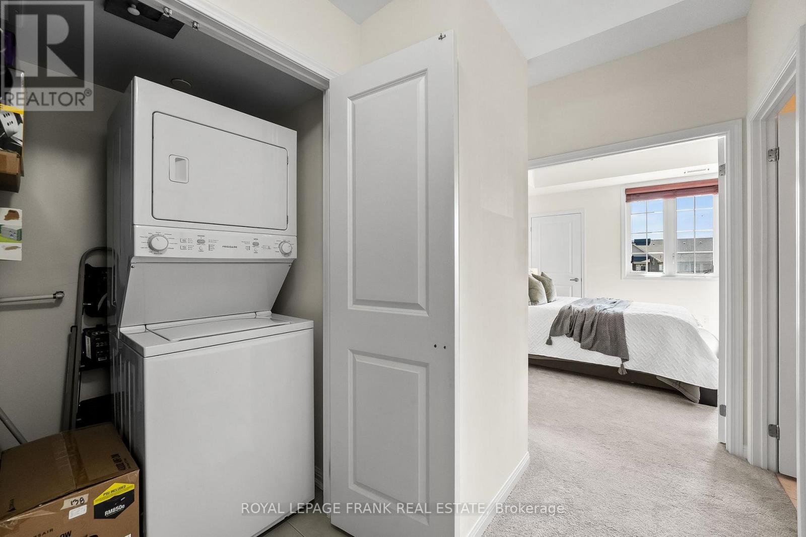 405 - 80 Aspen Springs Drive, Clarington (Bowmanville), ON - Indoor Photo Showing Laundry Room