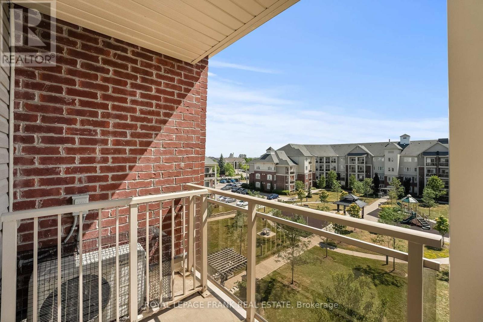 405 - 80 Aspen Springs Drive, Clarington (Bowmanville), ON - Outdoor With Balcony