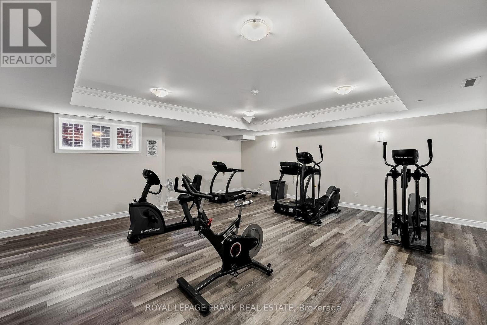 405 - 80 Aspen Springs Drive, Clarington (Bowmanville), ON - Indoor Photo Showing Gym Room