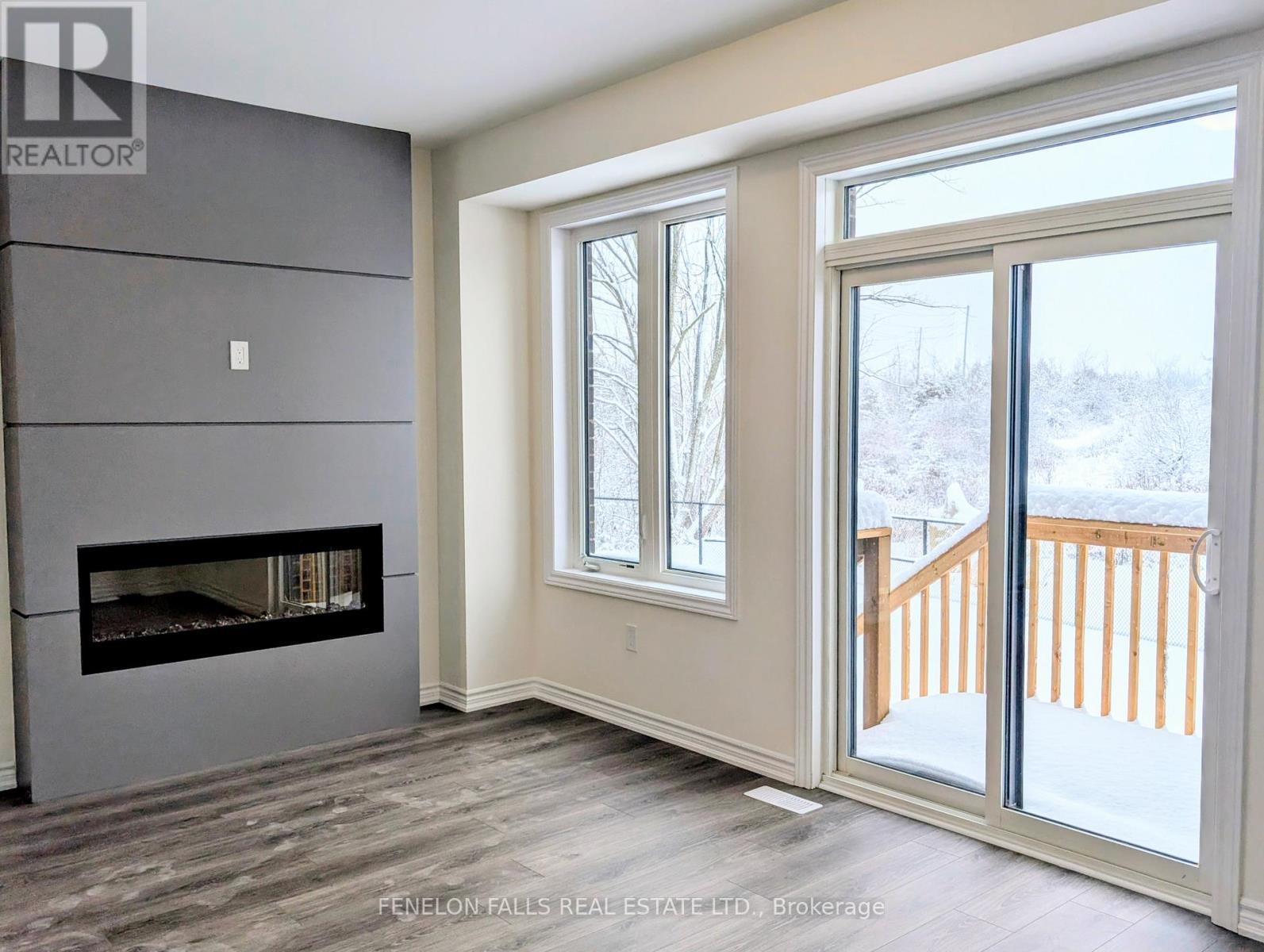 25 Hickey Lane, Kawartha Lakes (Lindsay), ON - Indoor With Fireplace
