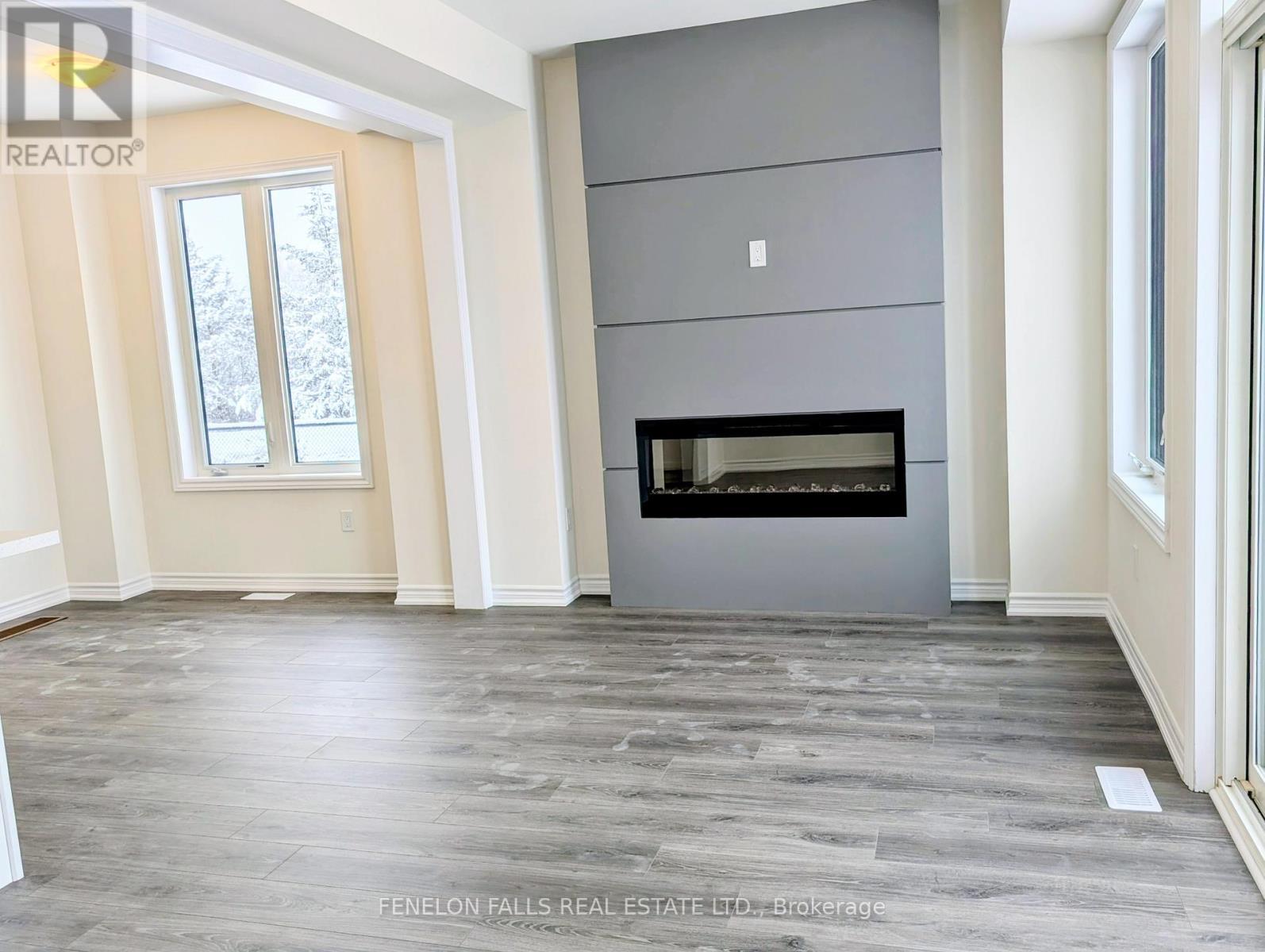 25 Hickey Lane, Kawartha Lakes (Lindsay), ON - Indoor With Fireplace