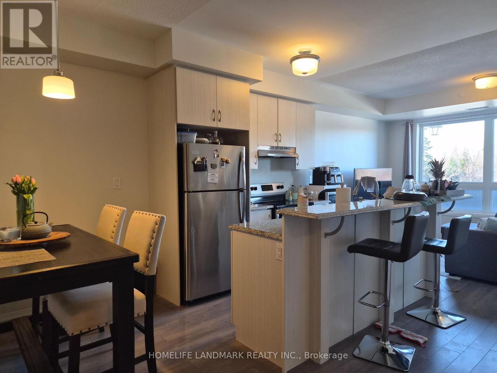 Open Kitchen layout - 213 - 2 Adam Sellers Street, Markham, ON - Indoor