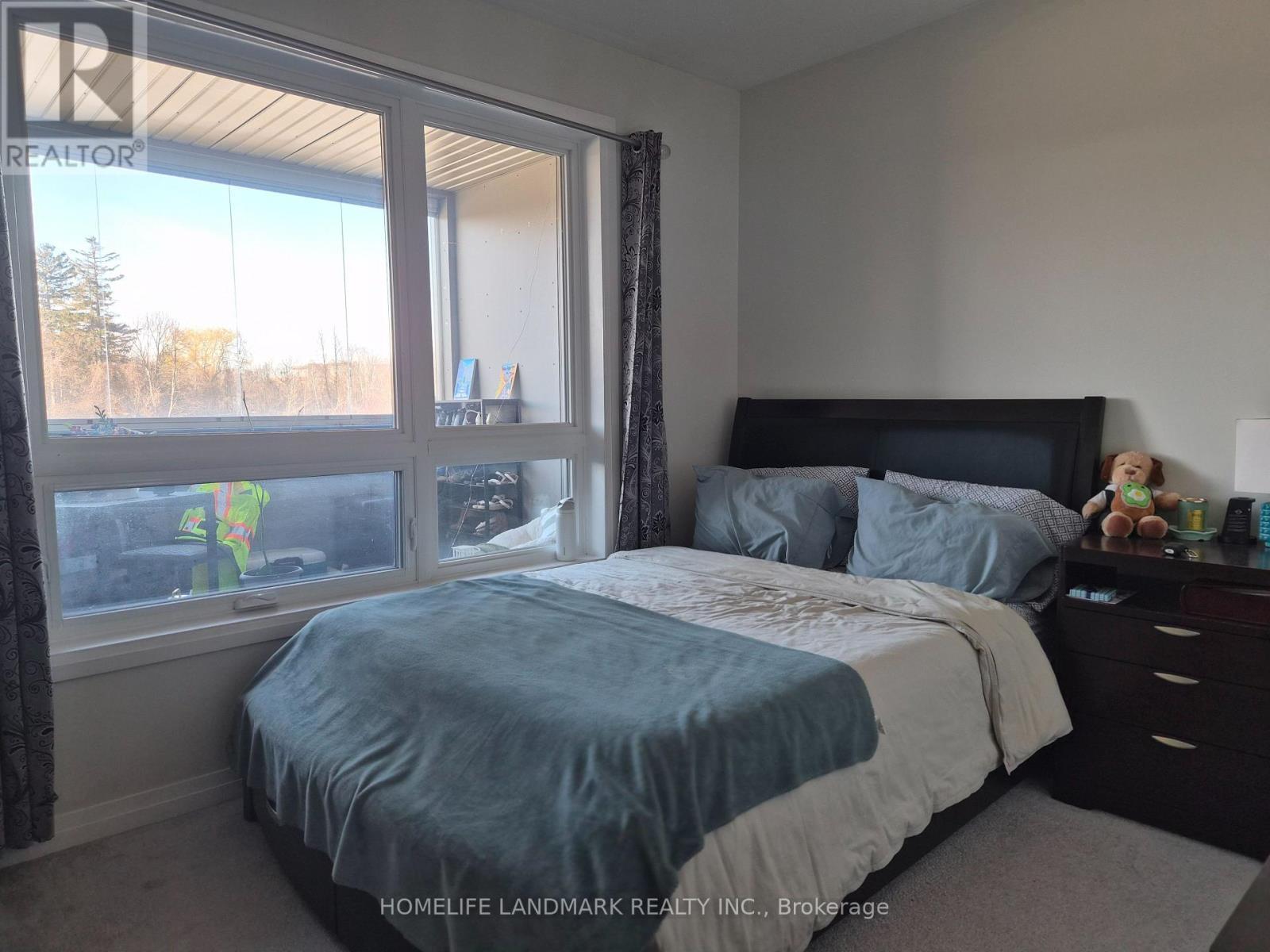 Bedroom - 213 - 2 Adam Sellers Street, Markham, ON - Indoor Photo Showing Bedroom