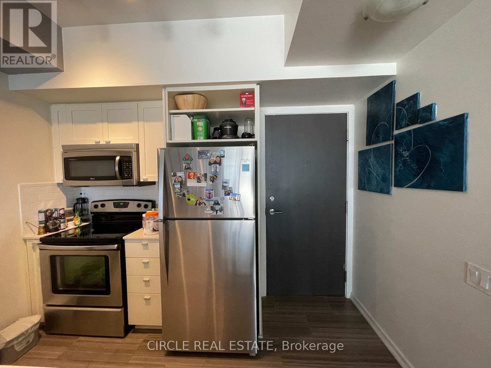 309 - 103 The Queensway Avenue N, Toronto, ON - Indoor Photo Showing Kitchen With Stainless Steel Kitchen