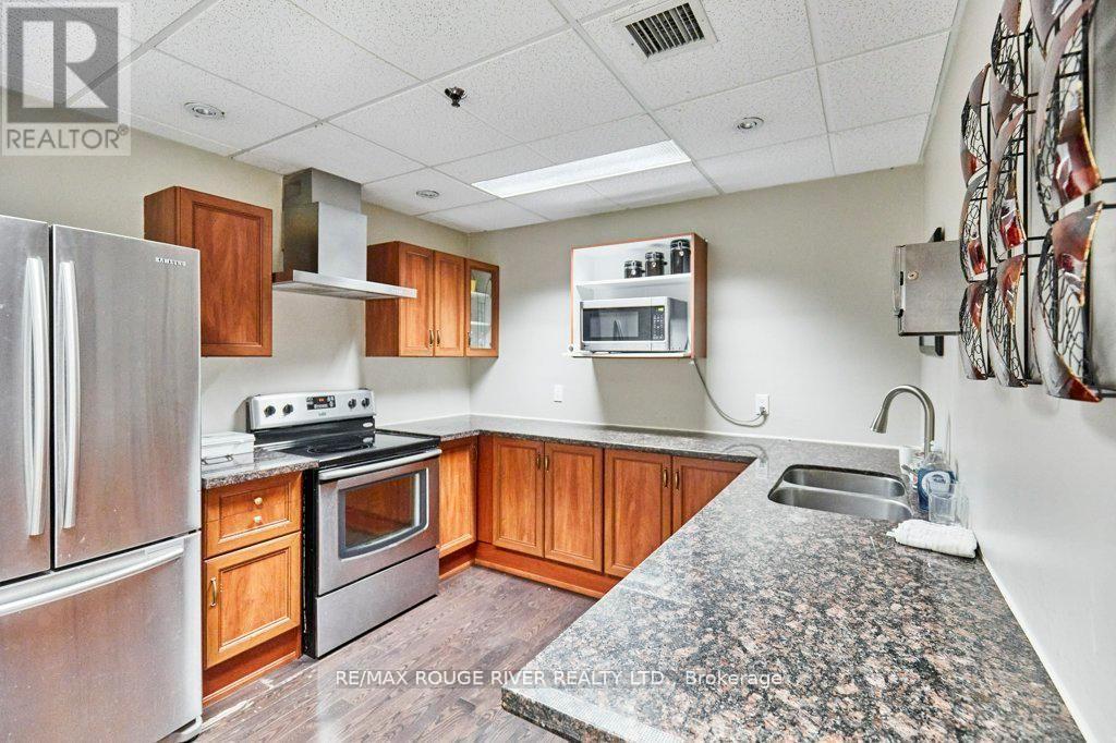 1103 - 4725 Sheppard Avenue E, Toronto, ON - Indoor Photo Showing Kitchen With Stainless Steel Kitchen With Double Sink