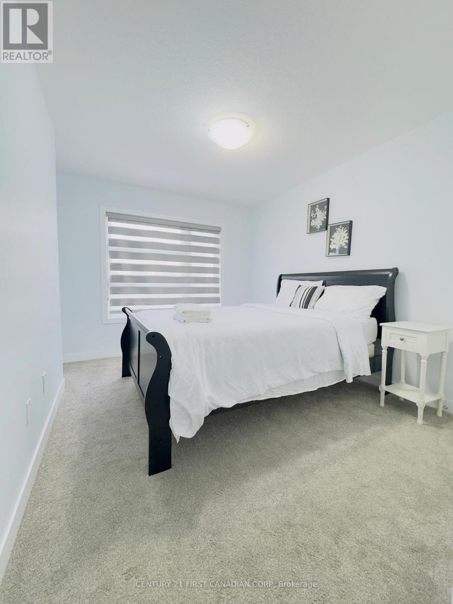 107 - 3380 Singleton Avenue, London South (South W), ON - Indoor Photo Showing Bedroom