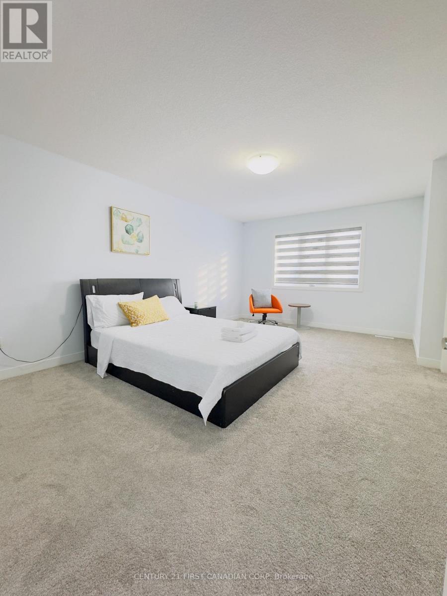 107 - 3380 Singleton Avenue, London South (South W), ON - Indoor Photo Showing Bedroom