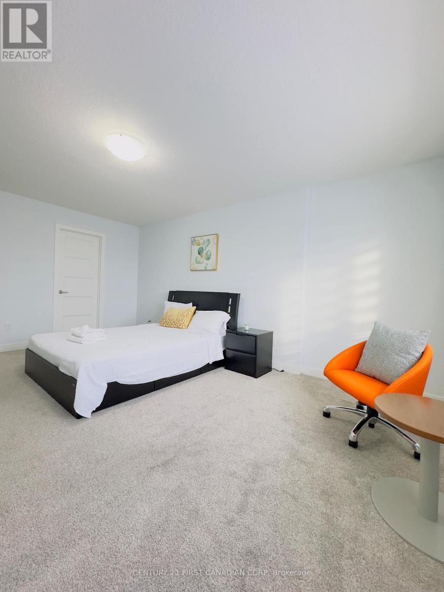 107 - 3380 Singleton Avenue, London South (South W), ON - Indoor Photo Showing Bedroom