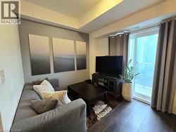 Living room featuring wood finished floors -