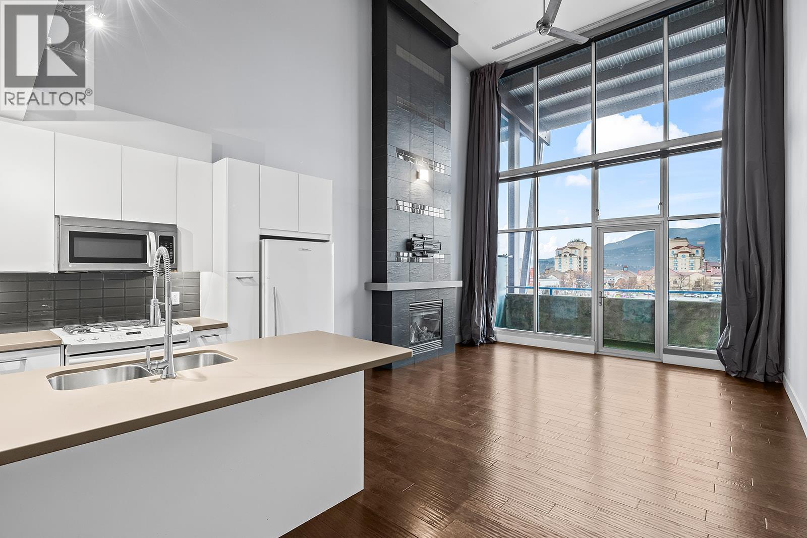 1289 Ellis Street Unit# 411, Kelowna, BC - Indoor Photo Showing Kitchen With Double Sink With Upgraded Kitchen