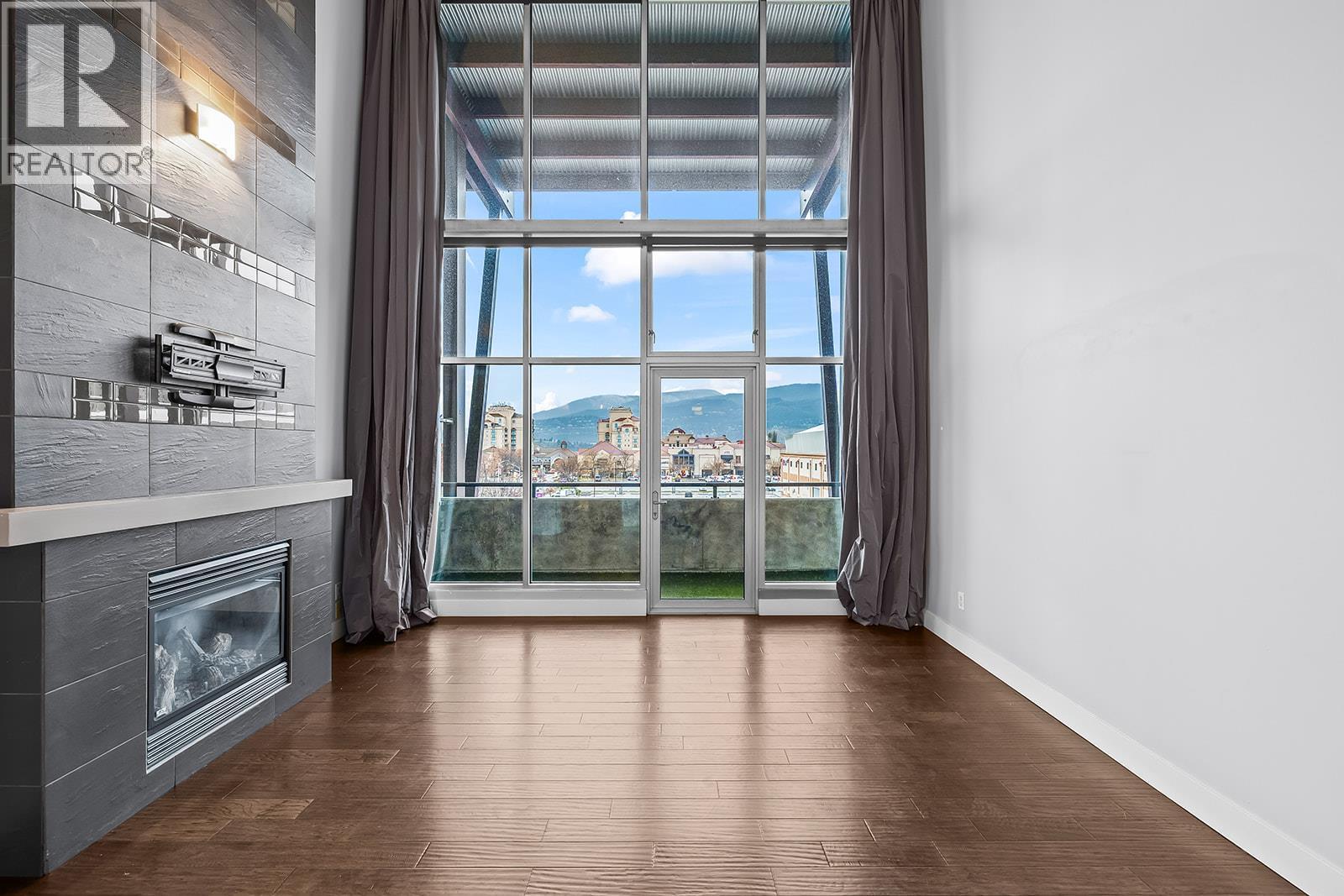 1289 Ellis Street Unit# 411, Kelowna, BC - Indoor With Fireplace