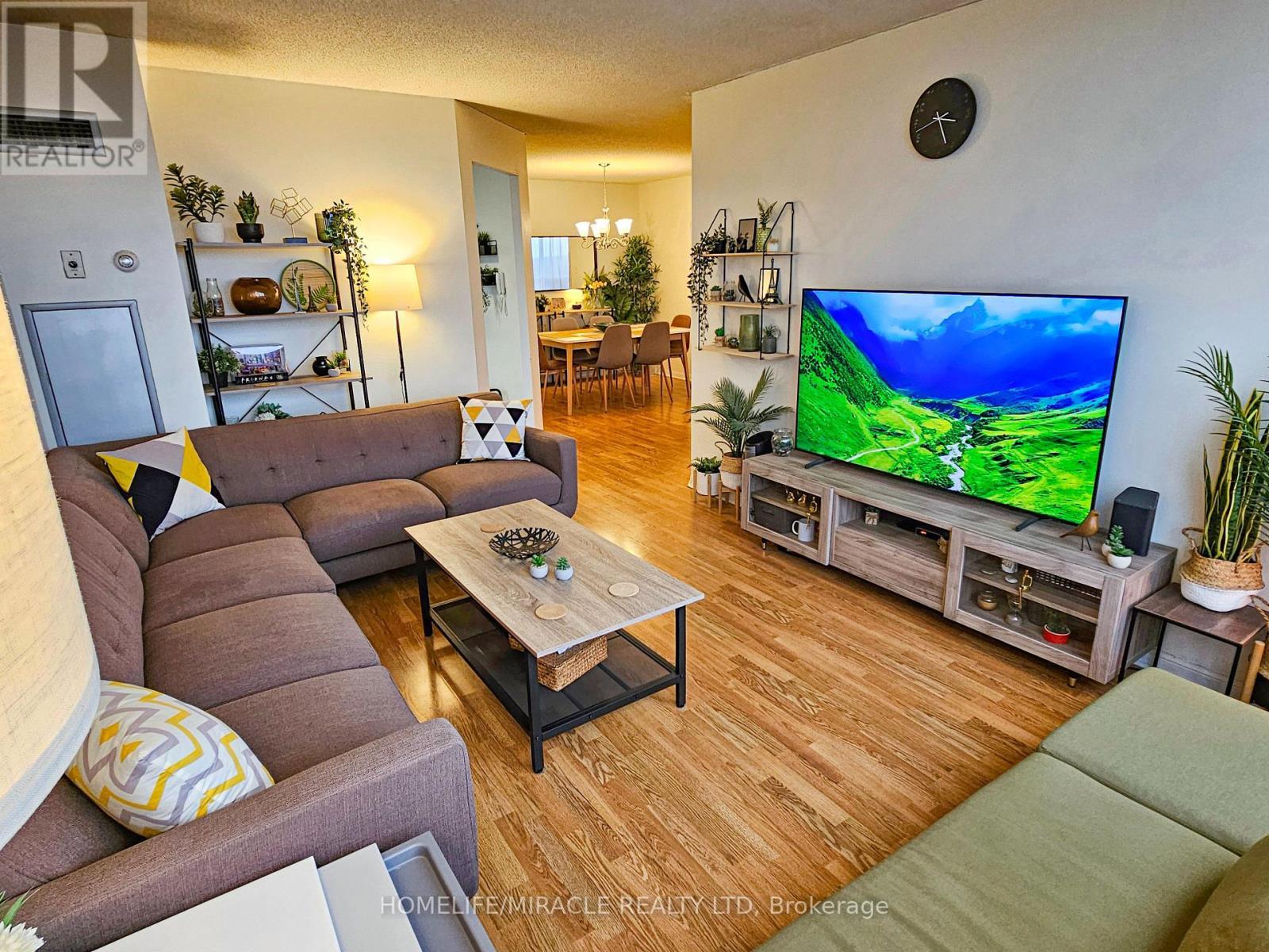 1206 - 12 Laurelcrest Street, Brampton, ON - Indoor Photo Showing Living Room