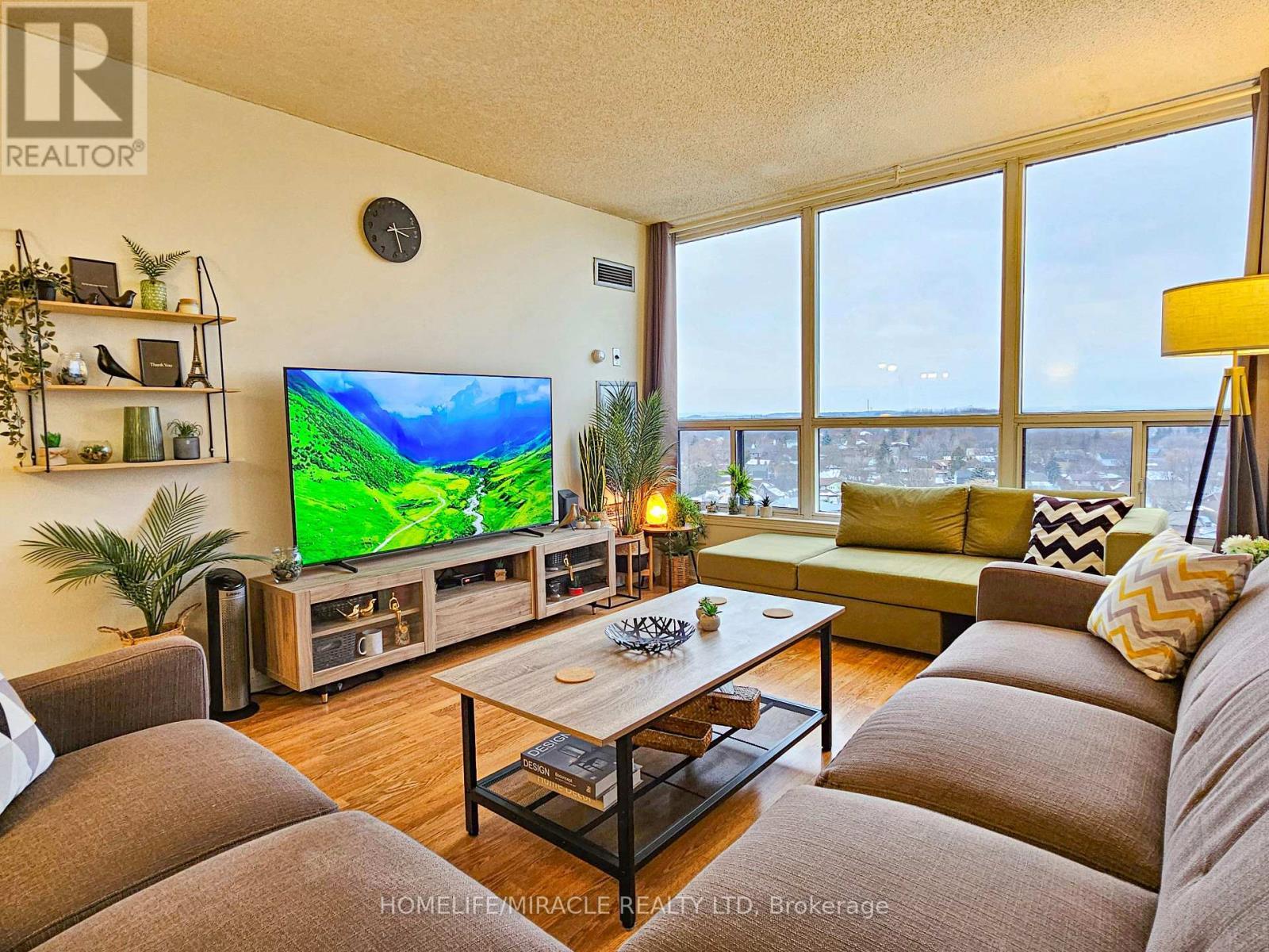 1206 - 12 Laurelcrest Street, Brampton, ON - Indoor Photo Showing Living Room