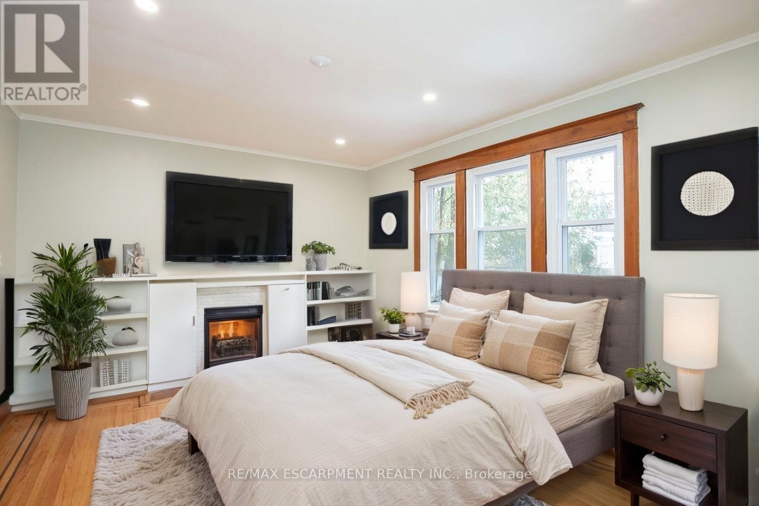 Virtually Staged - Bedroom 1 - 1 - 22 Prospect Street S, Hamilton, ON - Indoor Photo Showing Bedroom