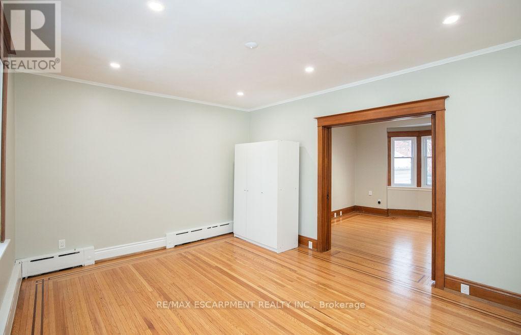 Bedroom 1 - 1 - 22 Prospect Street S, Hamilton, ON - Indoor Photo Showing Other Room