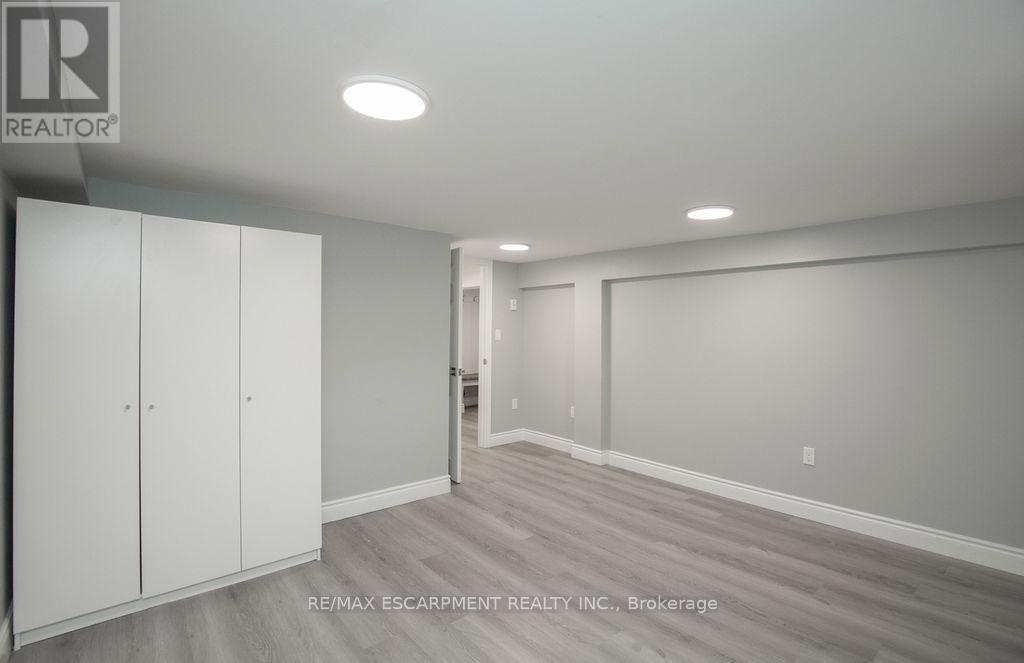 Lower Level Bedroom - 1 - 22 Prospect Street S, Hamilton, ON - Indoor Photo Showing Other Room