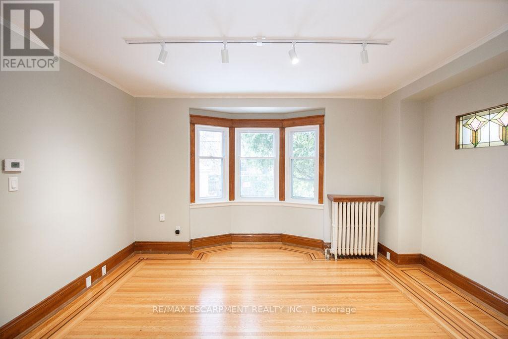 Living Room - 1 - 22 Prospect Street S, Hamilton, ON - Indoor Photo Showing Other Room