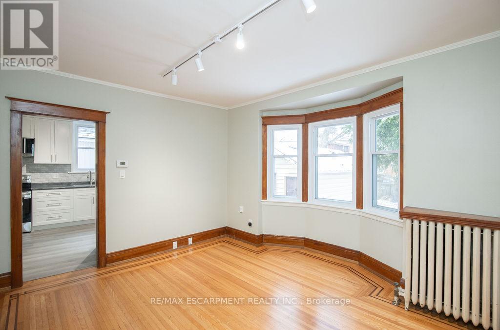 Living Room - 1 - 22 Prospect Street S, Hamilton, ON - Indoor Photo Showing Other Room