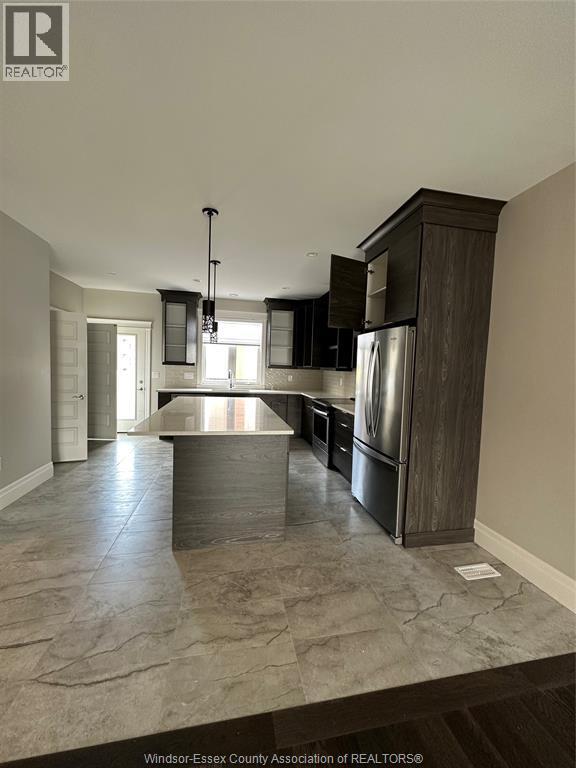 725 Brownstone Drive, Lakeshore, ON - Indoor Photo Showing Kitchen With Stainless Steel Kitchen