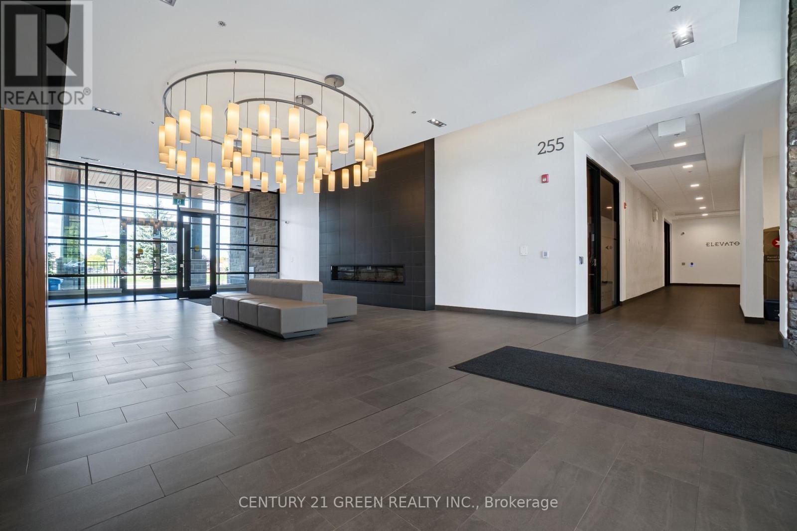 407 - 255 Northfield Drive E, Waterloo, ON - Indoor Photo Showing Other Room With Fireplace