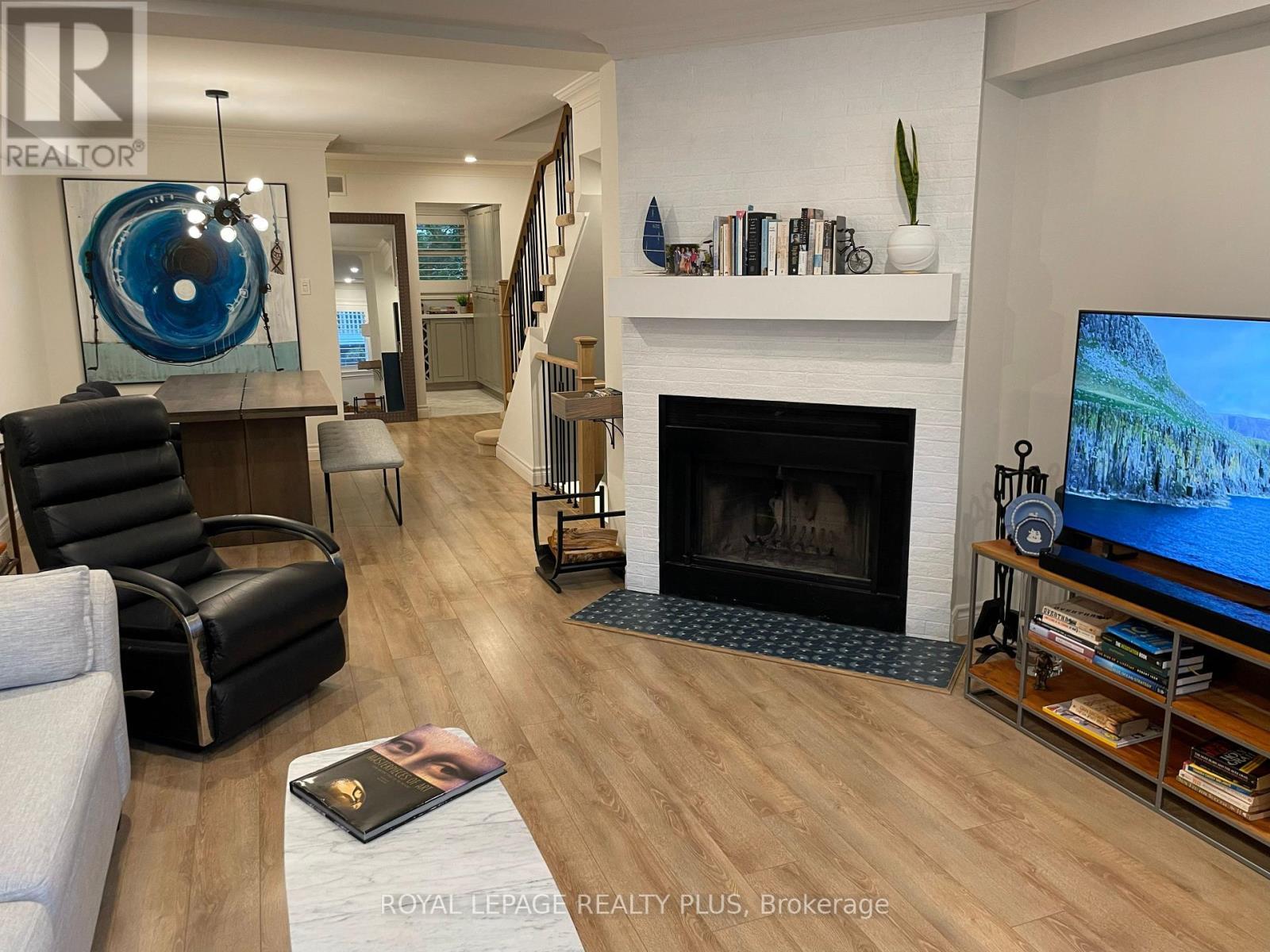 38C Shank Street, Toronto, ON - Indoor Photo Showing Living Room With Fireplace