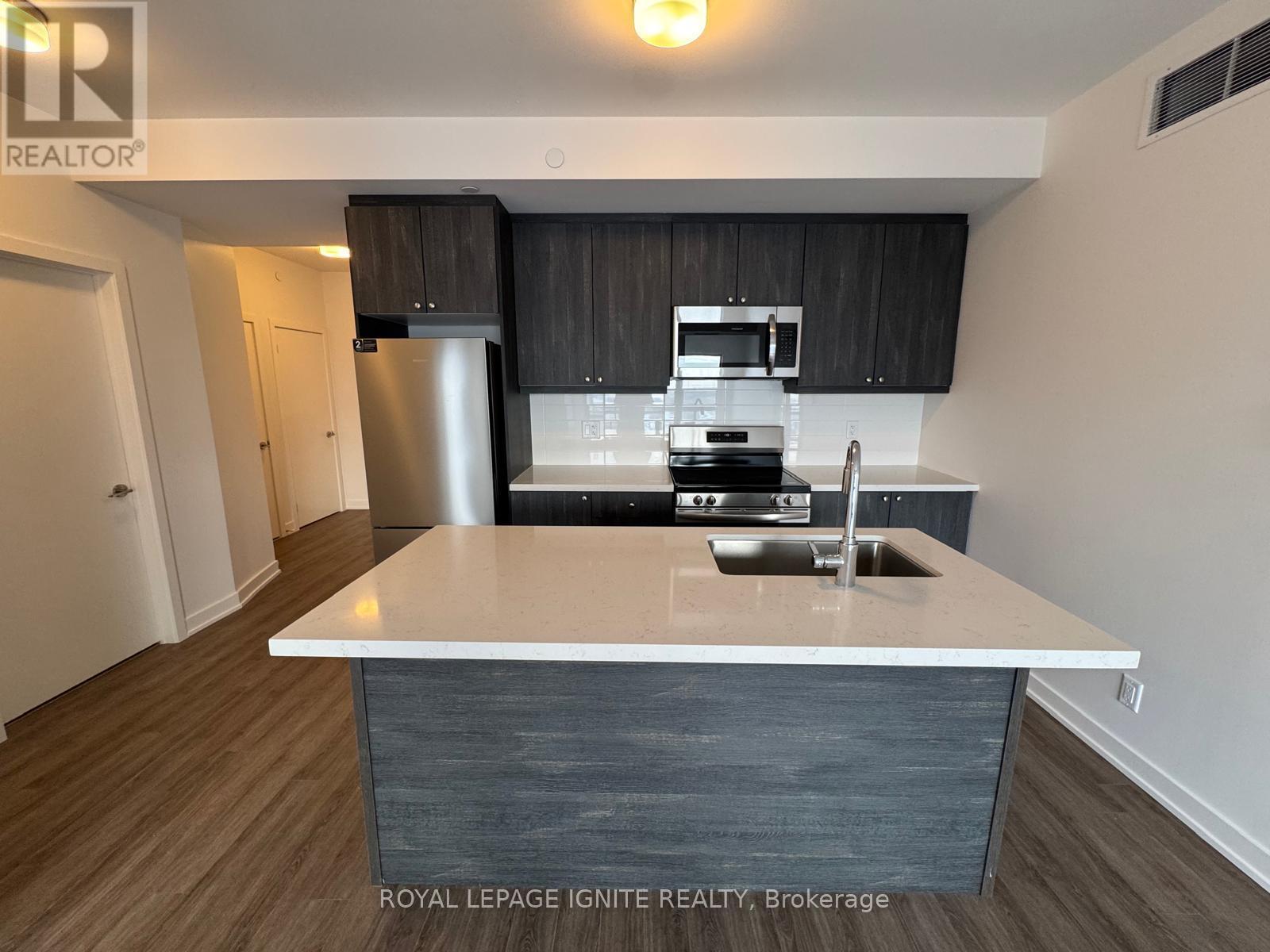 1201 - 55 Clarington Boulevard, Clarington, ON - Indoor Photo Showing Kitchen