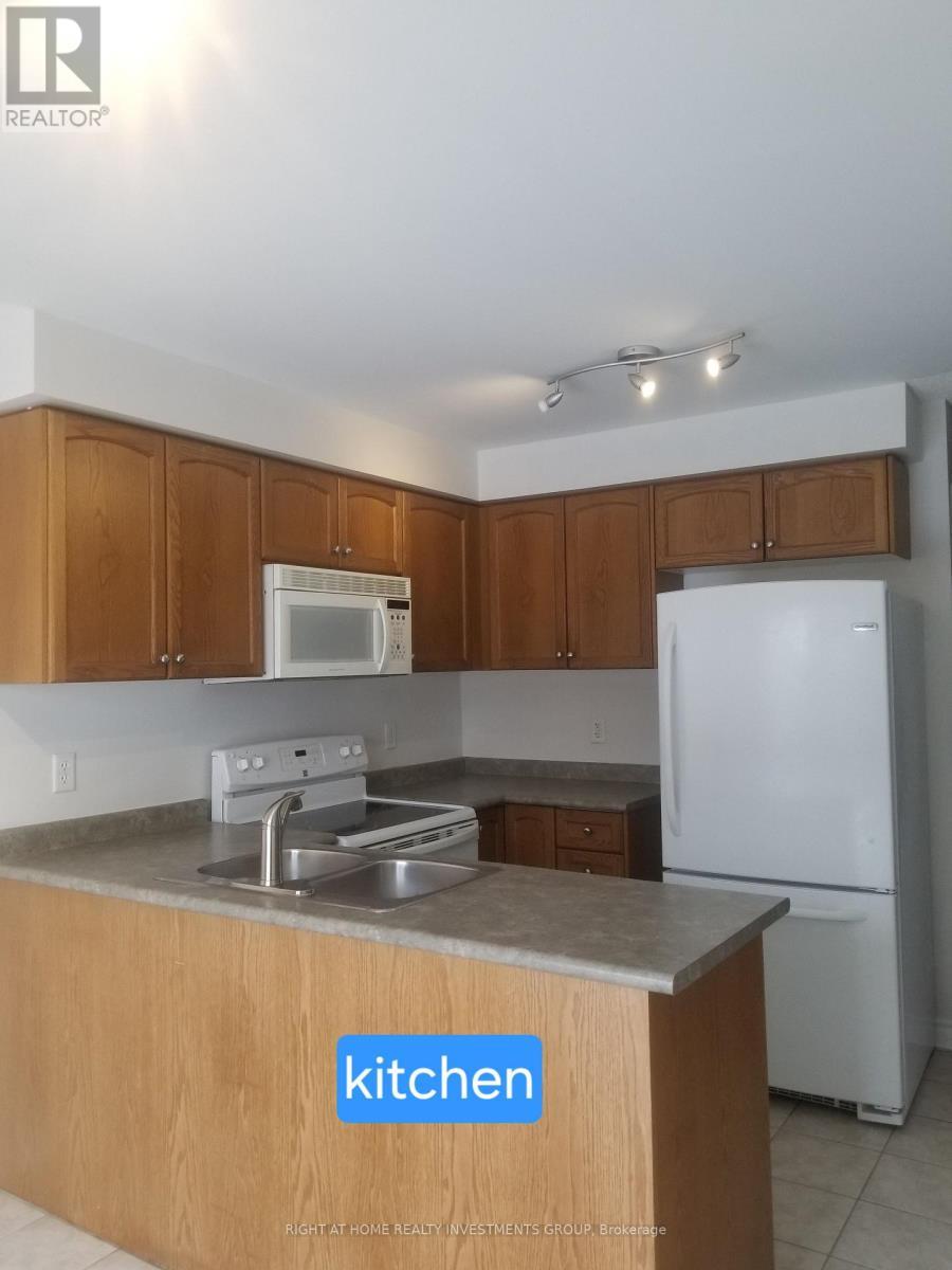Upper Unit - 38 Lang Drive, Barrie, ON - Indoor Photo Showing Kitchen With Double Sink