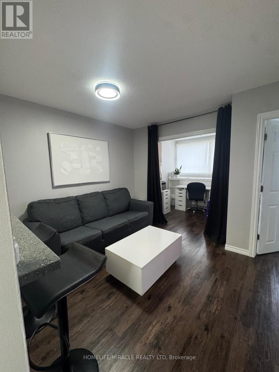 332 - 8351 Mclaughlin Road, Brampton, ON - Indoor Photo Showing Living Room