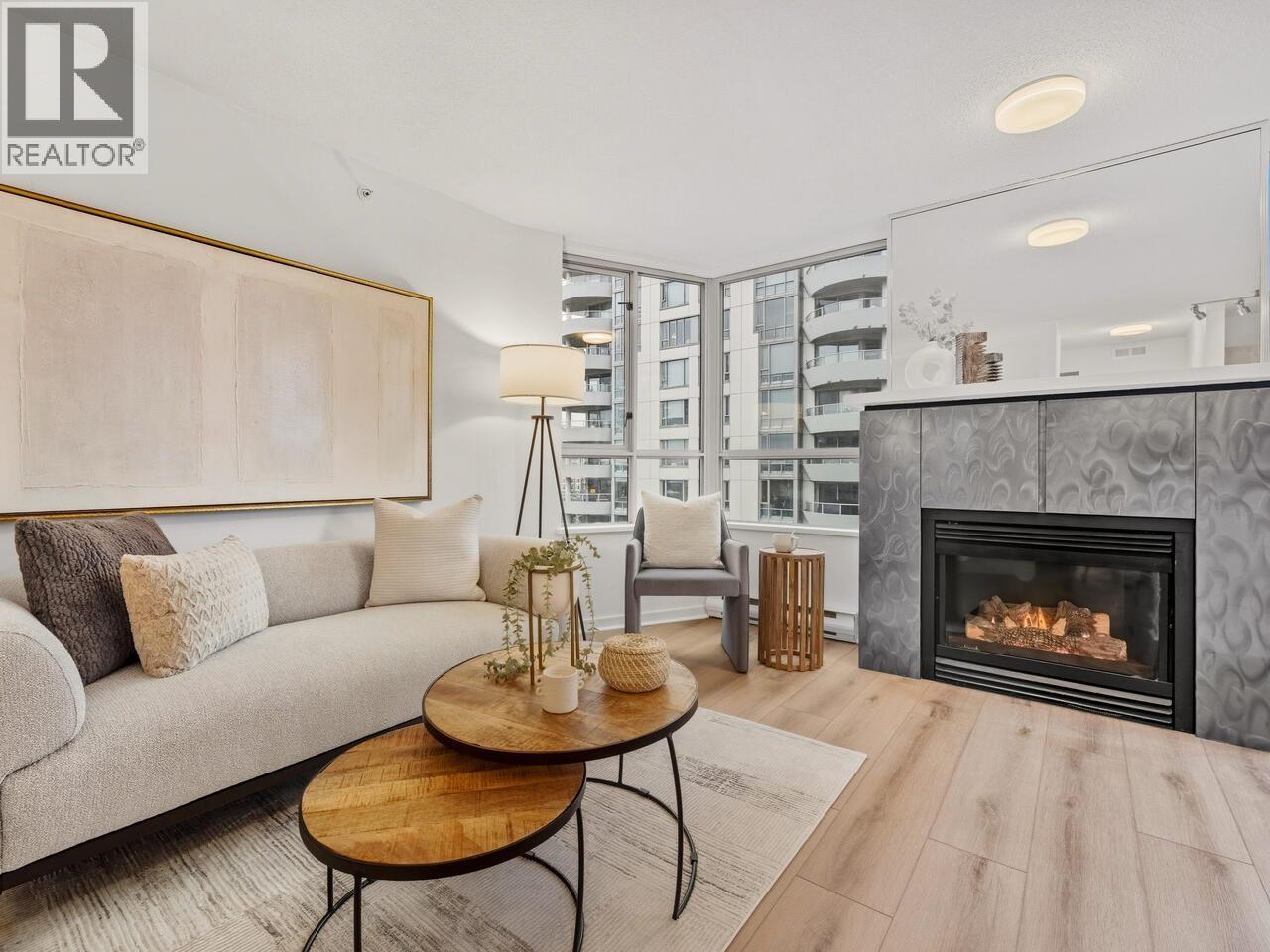 1407 1003 Pacific Street, Vancouver, BC - Indoor Photo Showing Living Room With Fireplace