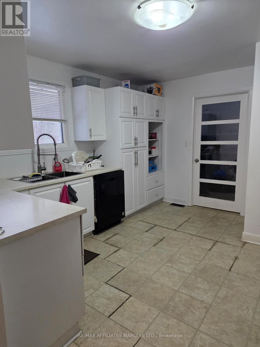 Kitchen and far door to laundry/mudroom - 3233 Richmond Drive, Cornwall, ON - Indoor Photo Showing Kitchen