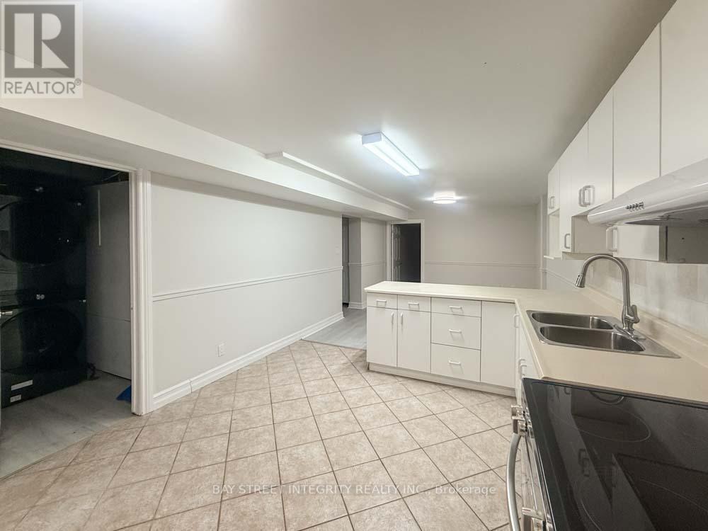 Lower - 130 Kingslake Road, Toronto, ON - Indoor Photo Showing Kitchen With Double Sink