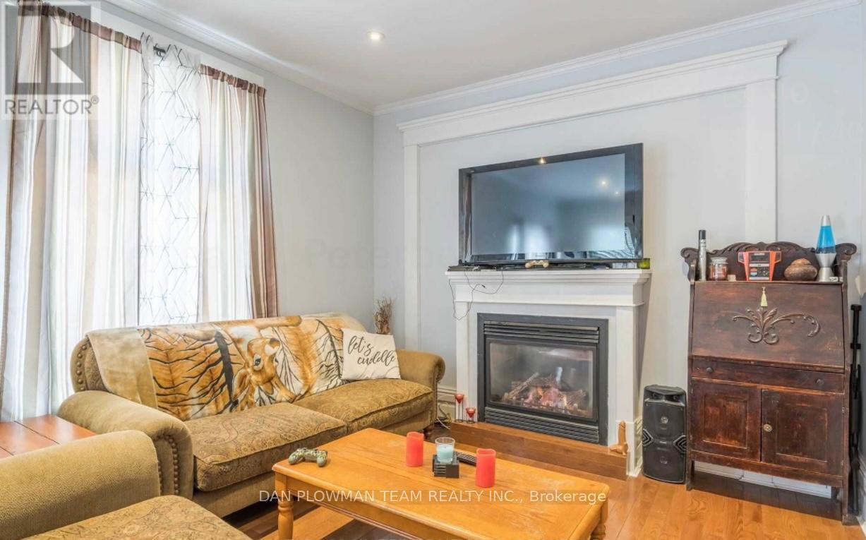16 Inverlea Street, Peterborough, ON - Indoor Photo Showing Living Room With Fireplace