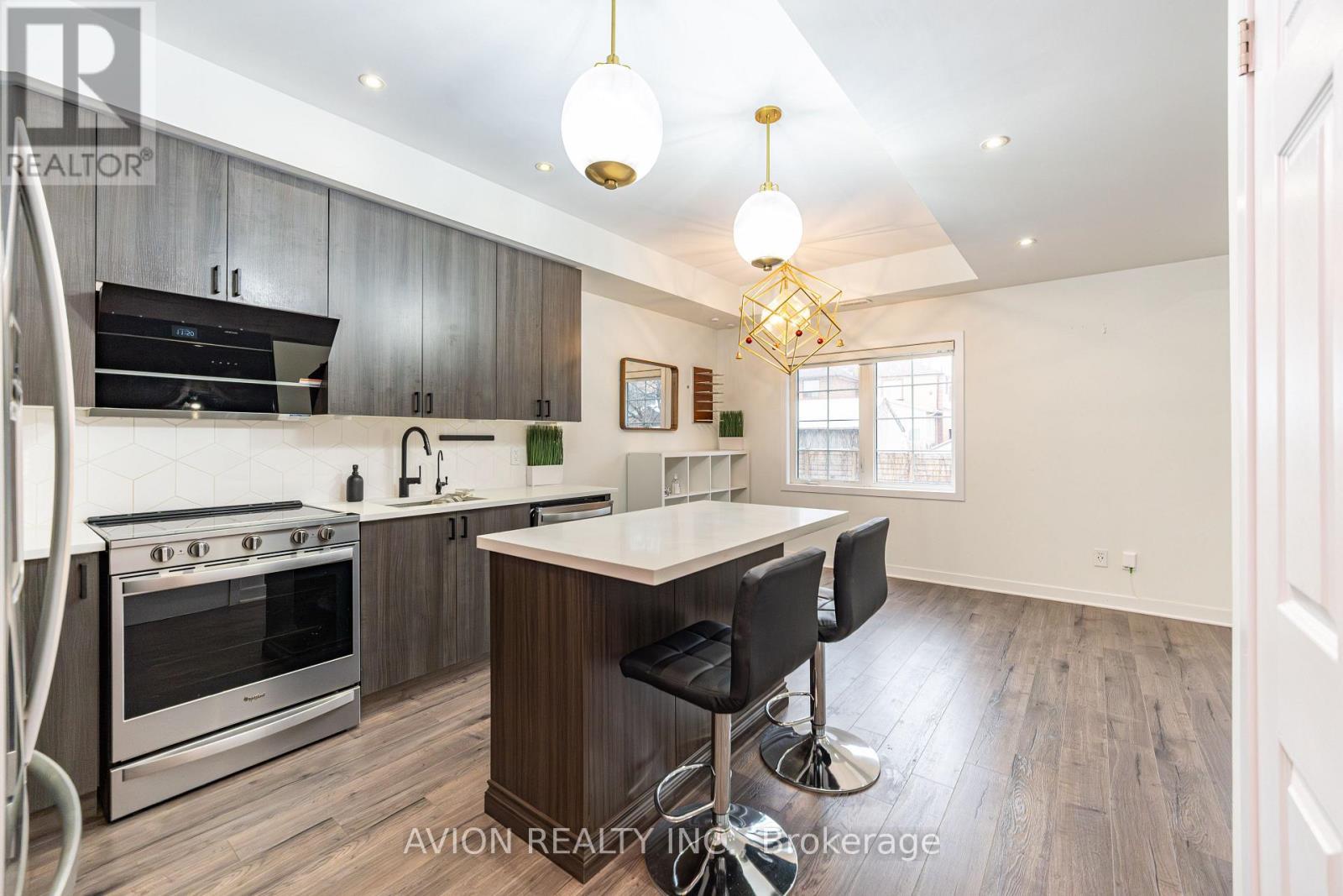 1 - 21 Forbes Avenue, Toronto, ON - Indoor Photo Showing Kitchen With Upgraded Kitchen