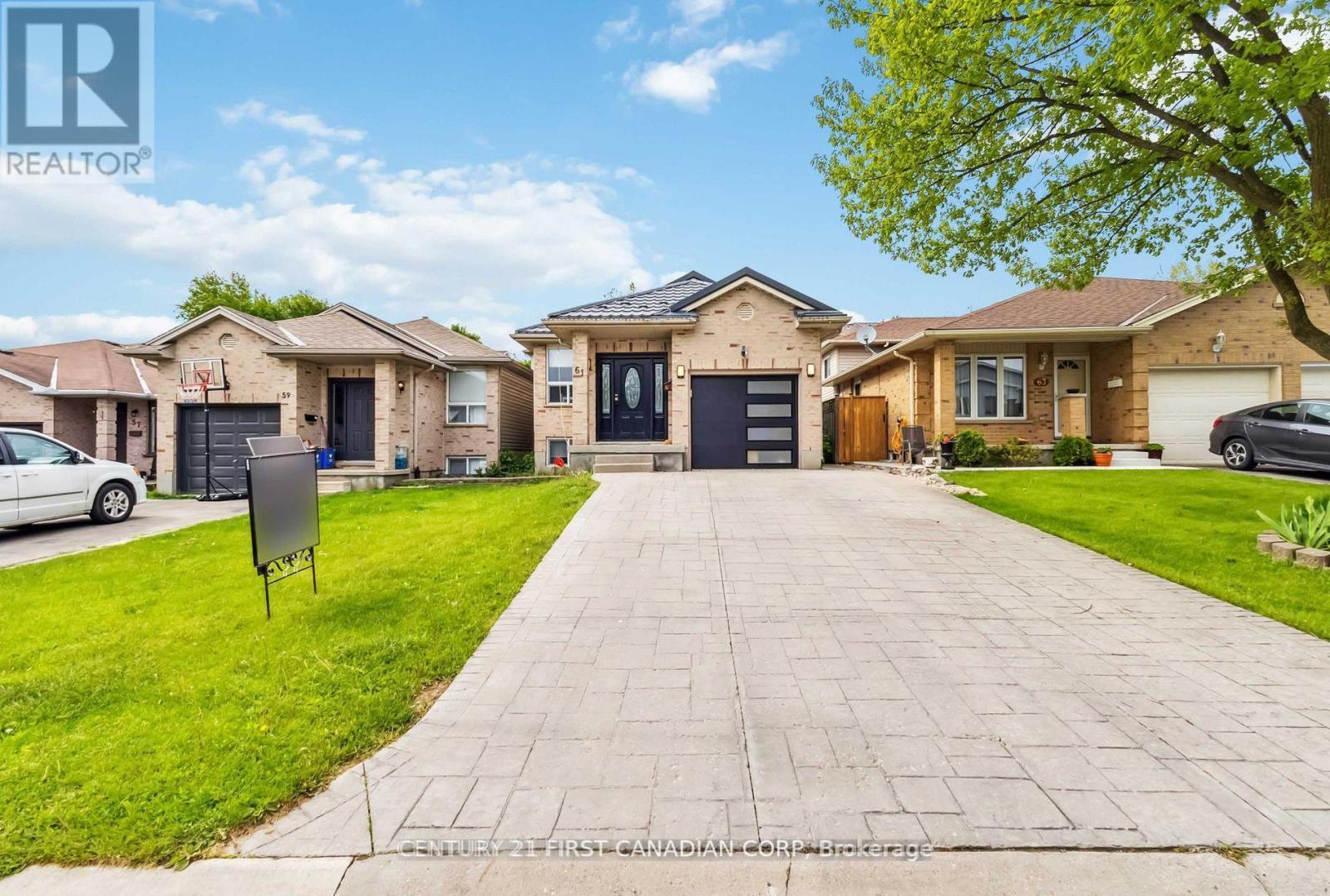 61 Tanner Drive, London East (East P), ON - Outdoor With Facade