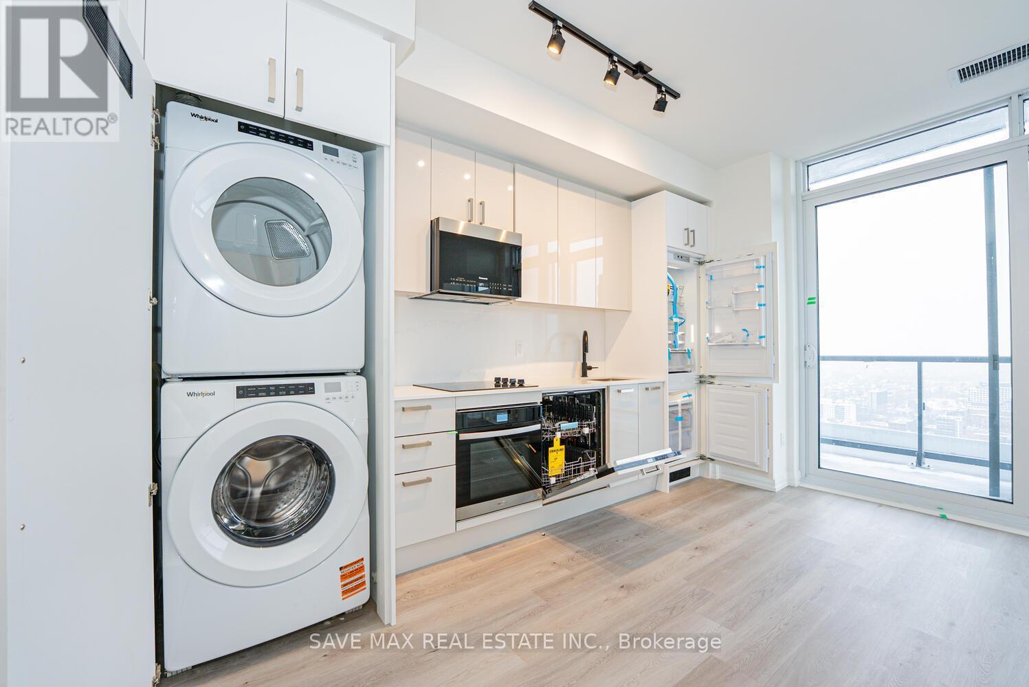 Ph 11 - 280 Dundas Street W, Toronto, ON - Indoor Photo Showing Laundry Room