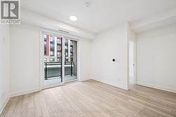 Living/Dining Area with Walkout to Private Balcony -