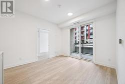 Living/Dining Area with Walkout to Private Balcony -