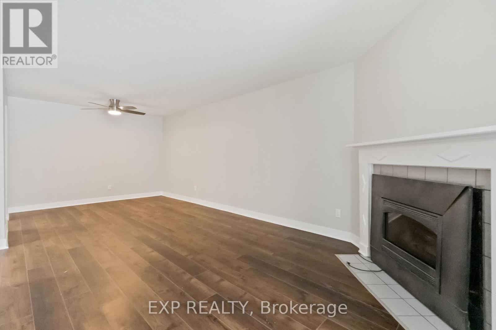 111 - 725 Deveron Crescent N, London South (South T), ON - Indoor With Fireplace