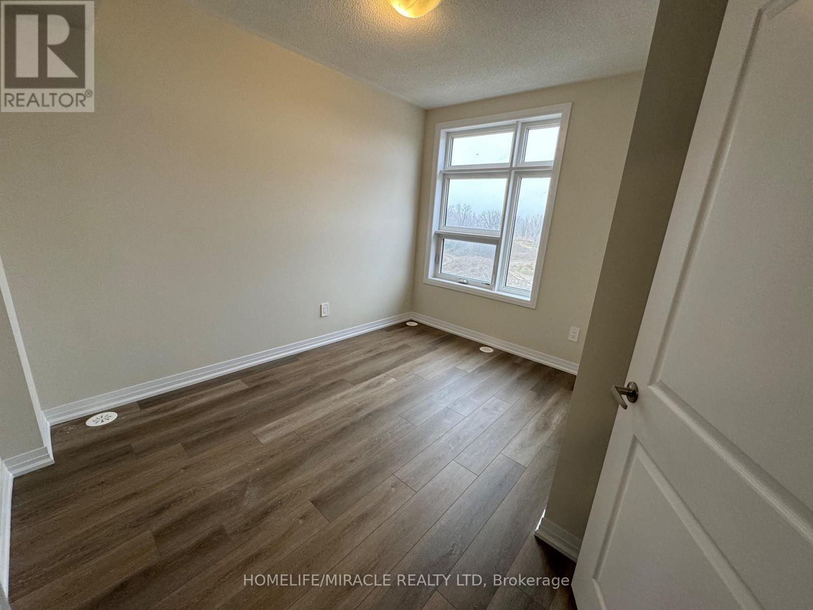 416 - 1577 Rose Way, Milton, ON - Indoor Photo Showing Other Room