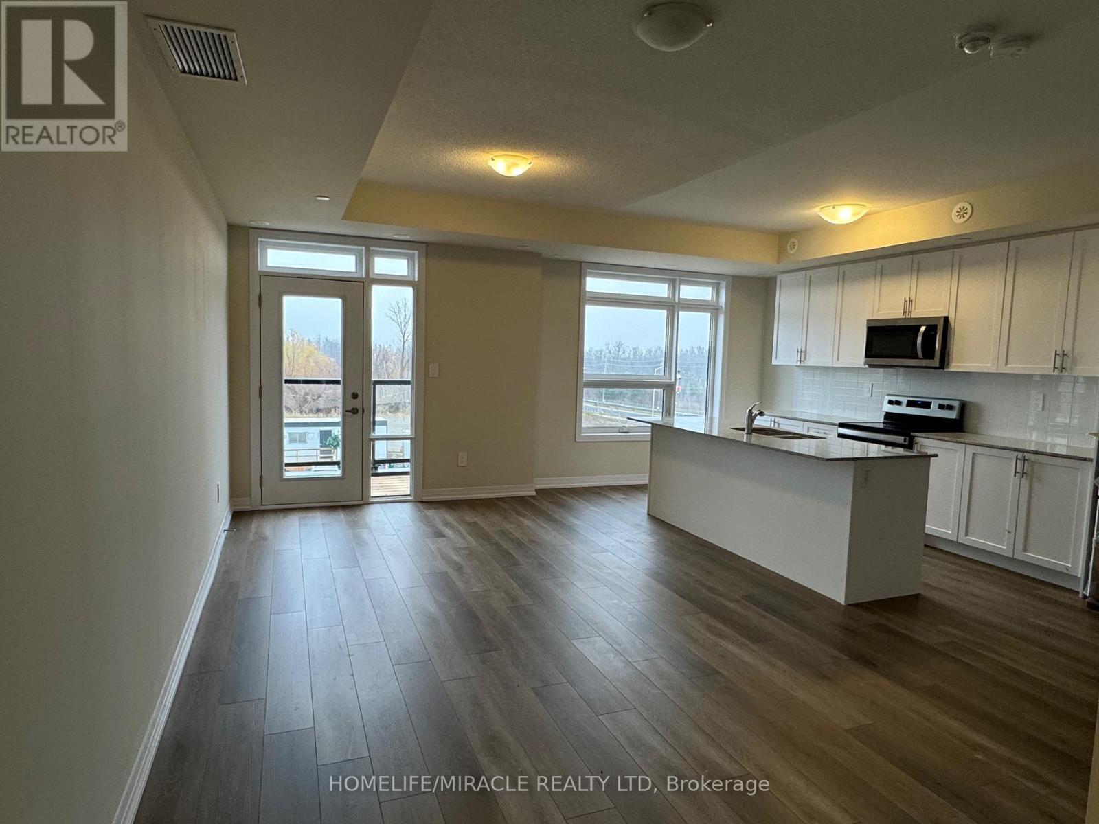416 - 1577 Rose Way, Milton, ON - Indoor Photo Showing Kitchen