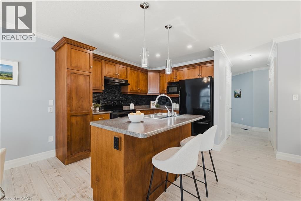 172 Porchlight Drive, Elmira, ON - Indoor Photo Showing Kitchen With Double Sink
