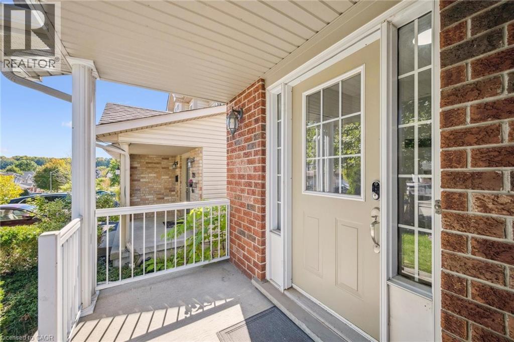 Entrance to property featuring brick siding - 723 Black Cherry Street, Waterloo, ON - Outdoor With Deck Patio Veranda With Exterior