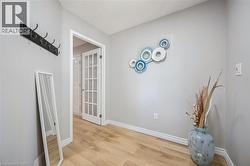 Hall featuring light wood-style floors and baseboards -