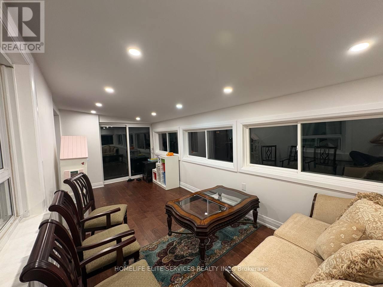 Sunroom/Living Room - 92 Crocus Drive, Toronto, ON - Indoor Photo Showing Living Room