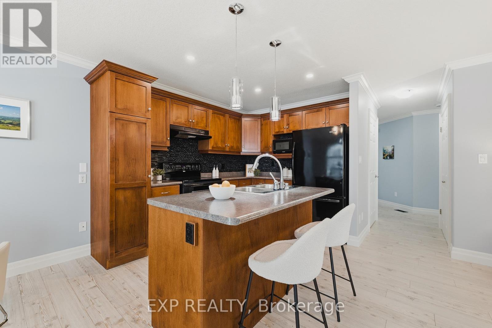 172 Porchlight Drive, Woolwich, ON - Indoor Photo Showing Kitchen With Double Sink