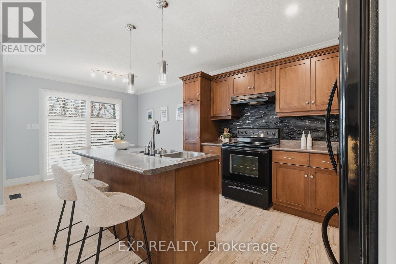172 Porchlight Drive, Woolwich, ON - Indoor Photo Showing Kitchen With Double Sink