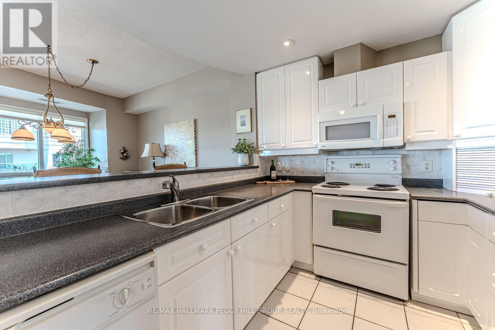 Ph2/3 - 2 Toronto Street, Barrie, ON - Indoor Photo Showing Kitchen With Double Sink