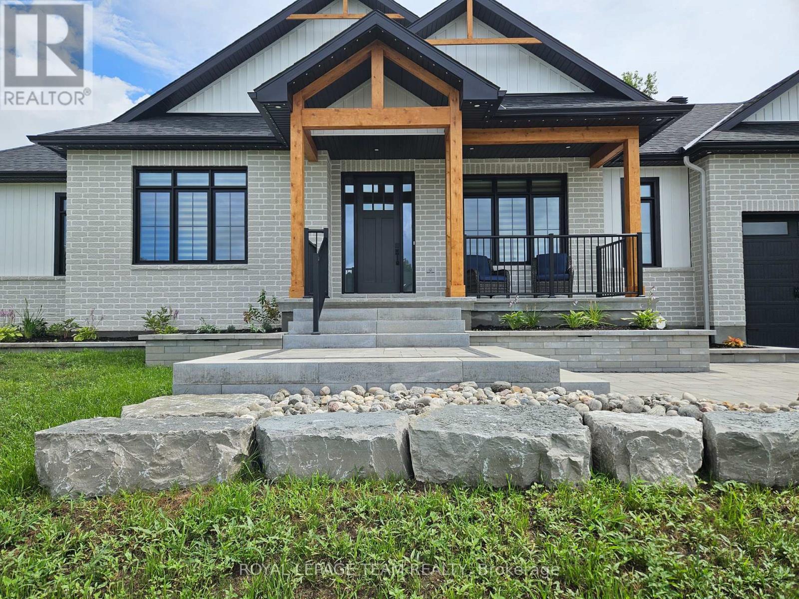 Summer photos to showcase interlock + landscaping - 1685 Trizisky Street, North Dundas, ON - Outdoor